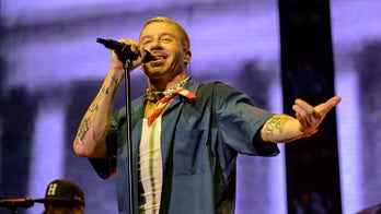 Macklemore declares 'F--- America' to cheers at Seattle concert benefiting UN agency with alleged Hamas ties